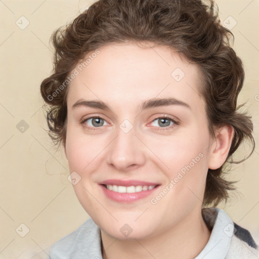 Joyful white young-adult female with medium  brown hair and green eyes