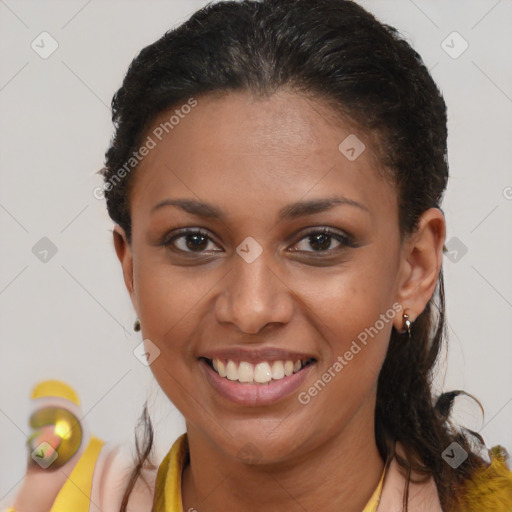 Joyful black young-adult female with medium  brown hair and brown eyes