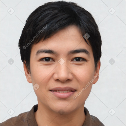 Joyful asian young-adult male with short  black hair and brown eyes