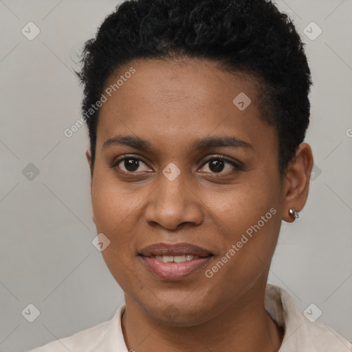 Joyful black young-adult female with short  black hair and brown eyes