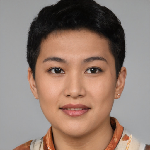 Joyful asian young-adult female with short  brown hair and brown eyes