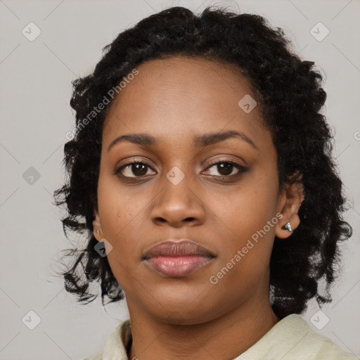 Neutral black young-adult female with medium  black hair and brown eyes