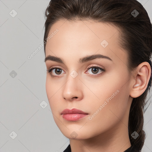 Neutral white young-adult female with long  brown hair and brown eyes