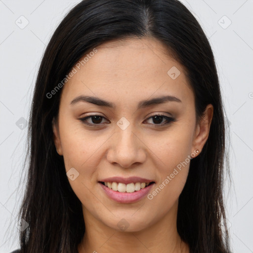 Joyful asian young-adult female with long  brown hair and brown eyes