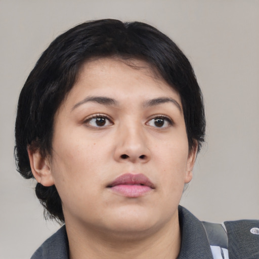 Neutral asian young-adult female with medium  brown hair and brown eyes
