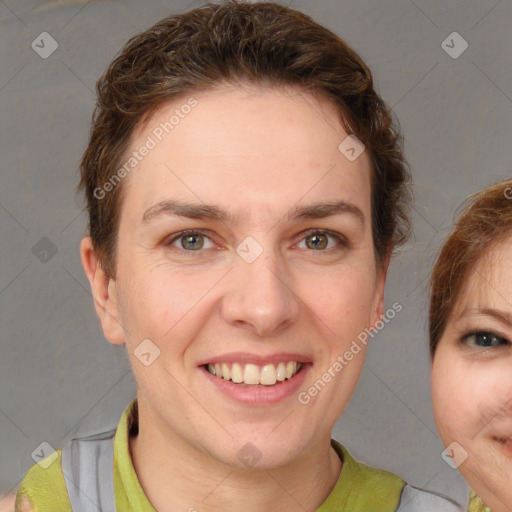 Joyful white adult female with short  brown hair and brown eyes