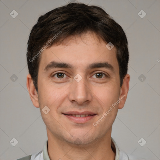 Joyful white young-adult male with short  brown hair and brown eyes