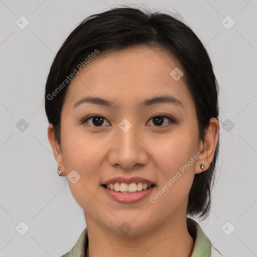 Joyful latino young-adult female with medium  brown hair and brown eyes