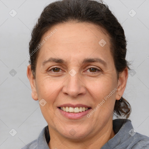 Joyful white adult female with short  brown hair and brown eyes