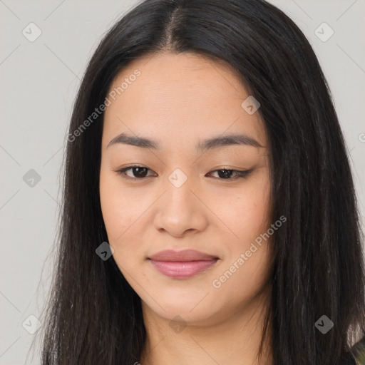 Joyful asian young-adult female with long  brown hair and brown eyes