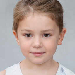 Joyful white child female with short  brown hair and brown eyes