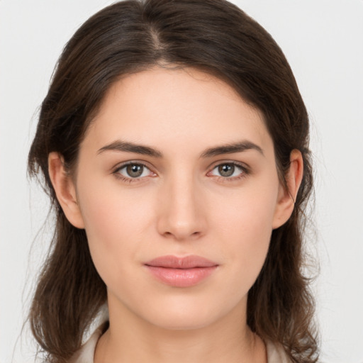 Neutral white young-adult female with medium  brown hair and brown eyes