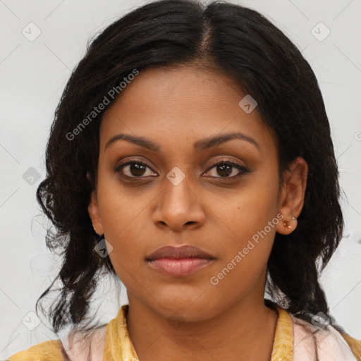 Joyful black young-adult female with medium  brown hair and brown eyes