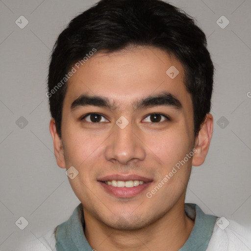 Joyful white young-adult male with short  black hair and brown eyes