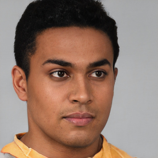 Neutral latino young-adult male with short  brown hair and brown eyes