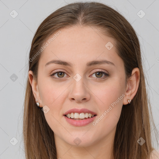 Joyful white young-adult female with long  brown hair and grey eyes