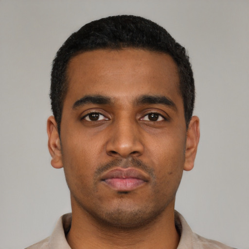 Neutral latino young-adult male with short  black hair and brown eyes