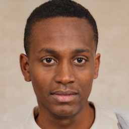 Neutral black young-adult male with short  brown hair and brown eyes