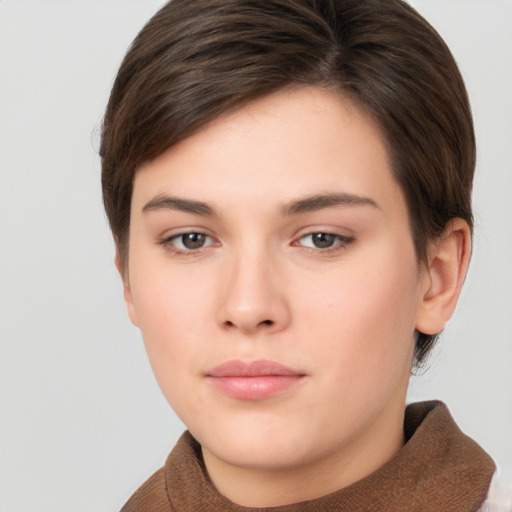 Neutral white young-adult female with short  brown hair and brown eyes