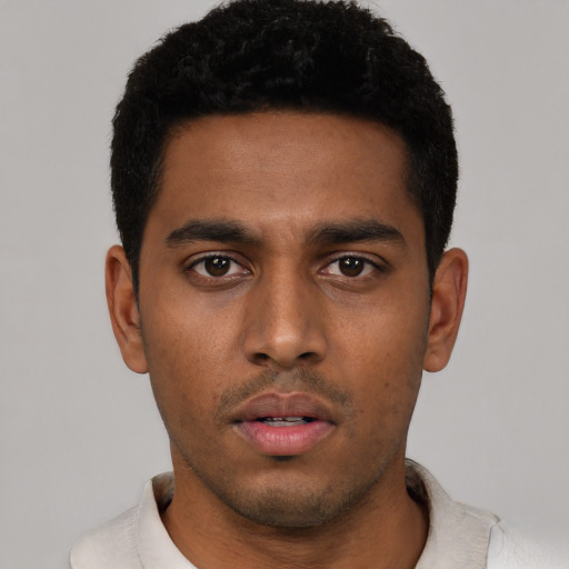 Neutral black young-adult male with short  black hair and brown eyes