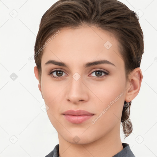 Neutral white young-adult female with short  brown hair and brown eyes