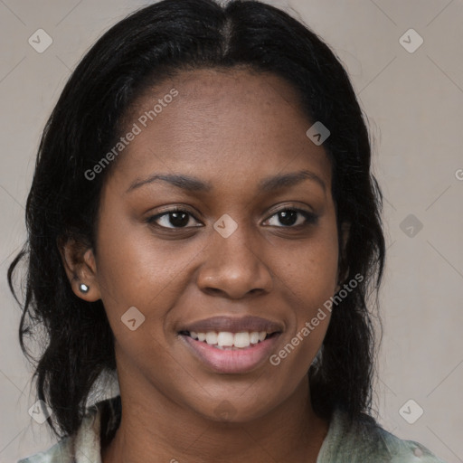 Joyful black young-adult female with medium  brown hair and brown eyes