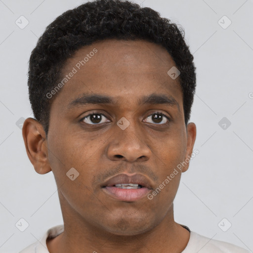 Neutral black young-adult male with short  brown hair and brown eyes
