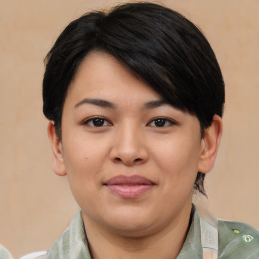 Joyful asian young-adult female with short  black hair and brown eyes