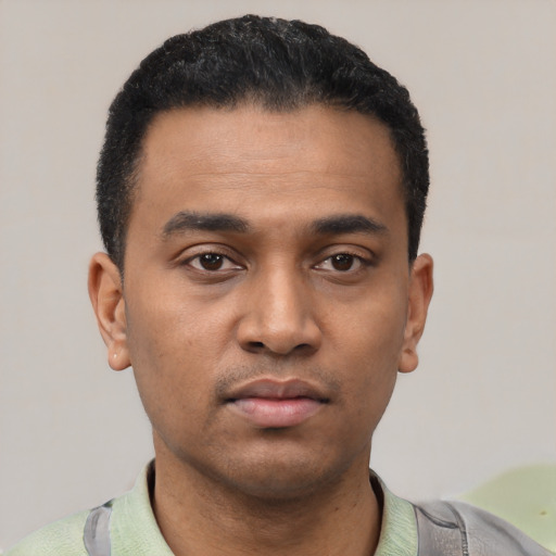 Neutral latino young-adult male with short  black hair and brown eyes