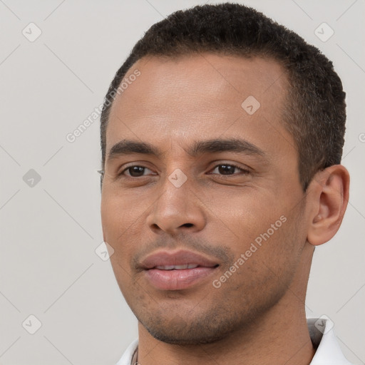 Neutral white young-adult male with short  brown hair and brown eyes