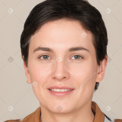 Joyful white young-adult female with short  brown hair and brown eyes