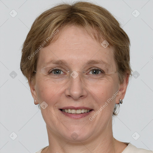 Joyful white adult female with short  brown hair and grey eyes