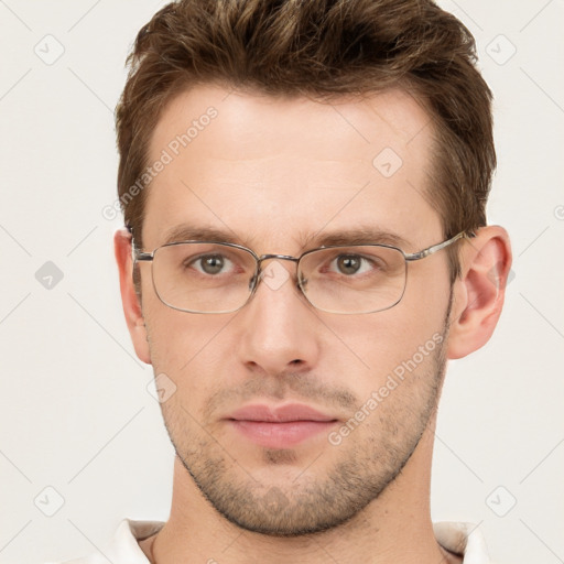 Neutral white young-adult male with short  brown hair and grey eyes