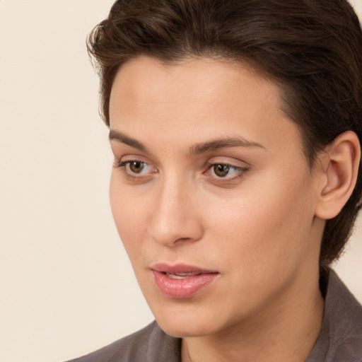 Neutral white young-adult female with medium  brown hair and brown eyes