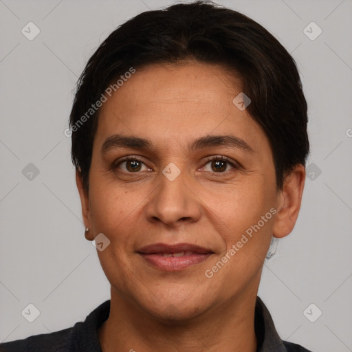 Joyful white adult female with short  brown hair and brown eyes