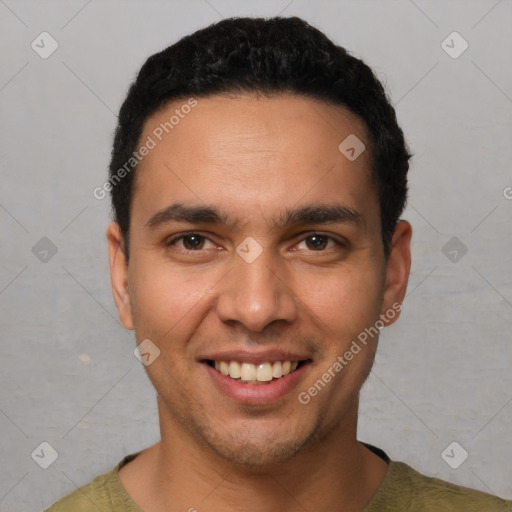 Joyful white young-adult male with short  black hair and brown eyes