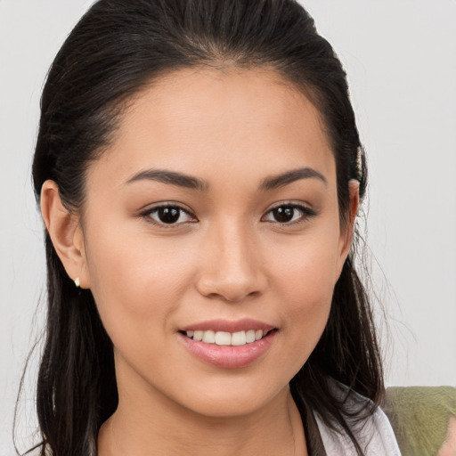 Joyful white young-adult female with medium  brown hair and brown eyes