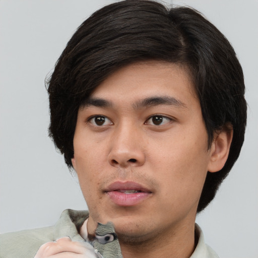 Neutral asian young-adult male with short  black hair and brown eyes
