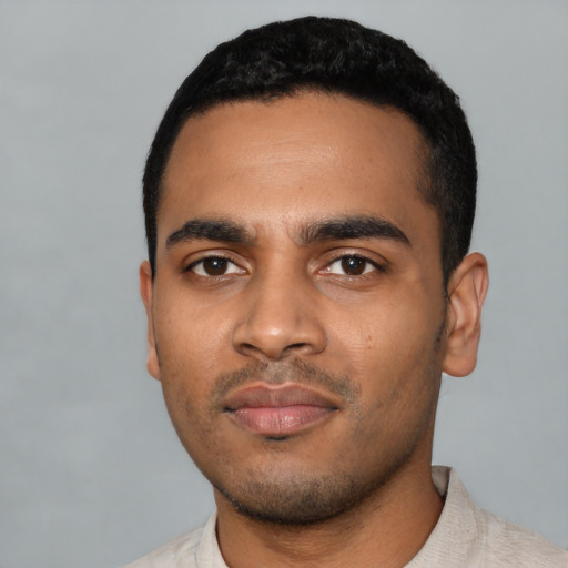 Neutral latino young-adult male with short  black hair and brown eyes