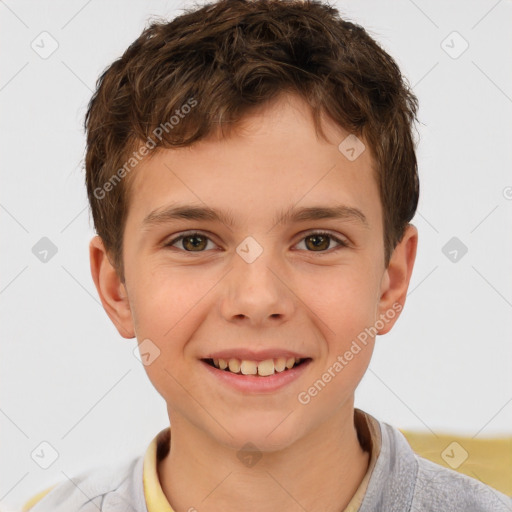 Joyful white child male with short  brown hair and brown eyes