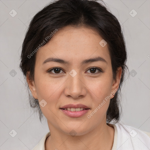 Joyful latino young-adult female with medium  brown hair and brown eyes