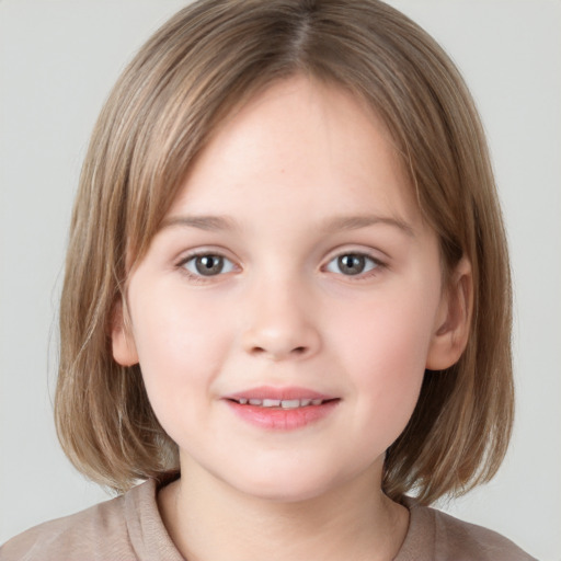 Joyful white child female with medium  brown hair and grey eyes