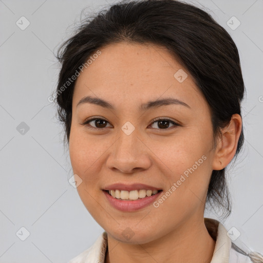 Joyful white young-adult female with medium  brown hair and brown eyes