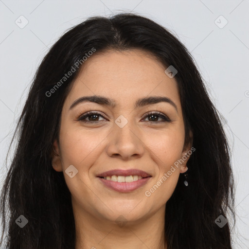 Joyful latino young-adult female with long  brown hair and brown eyes