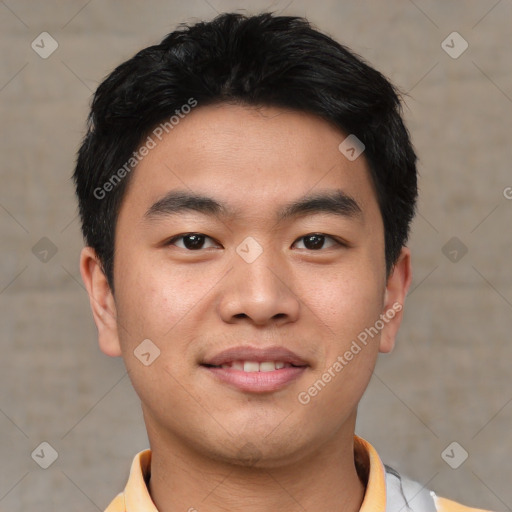 Joyful asian young-adult male with short  black hair and brown eyes