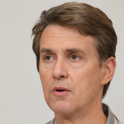 Neutral white adult male with short  brown hair and brown eyes