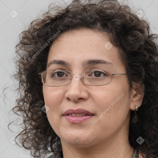 Joyful white adult female with long  brown hair and brown eyes