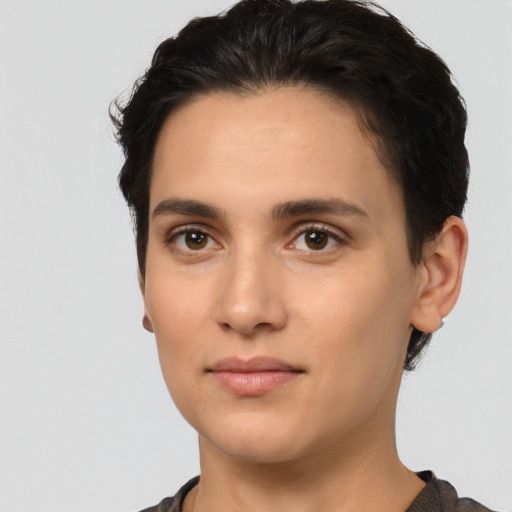Neutral latino young-adult female with short  black hair and brown eyes