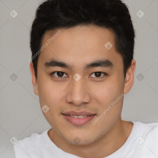 Joyful latino young-adult male with short  brown hair and brown eyes