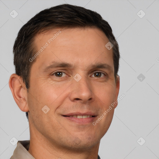 Joyful white adult male with short  brown hair and brown eyes